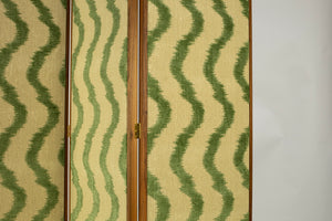 Bespoke walnut room divider screen by Maison Lily Blue, upholstered in Colony by Casa Luiza fabric with signature floating panel design.
