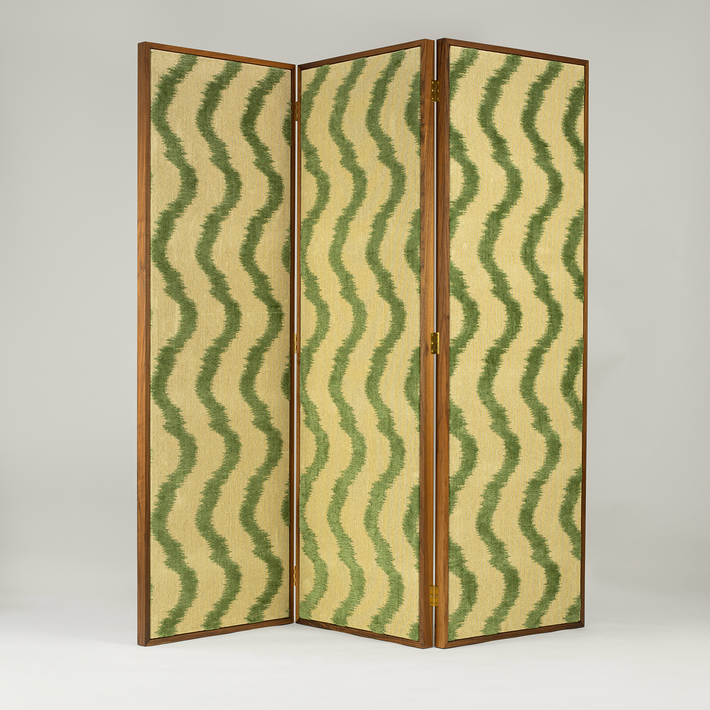Bespoke walnut room divider screen by Maison Lily Blue, upholstered in Colony by Casa Luiza fabric with signature floating panel design.
